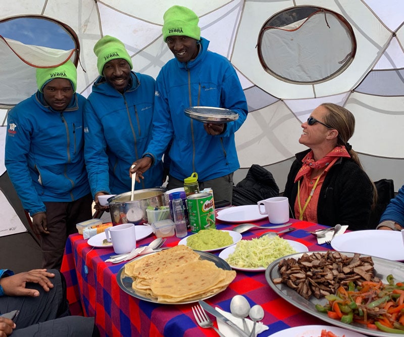 Barking Zebra crew serves lunch at Lava Tower while climbing Kilimanjaro